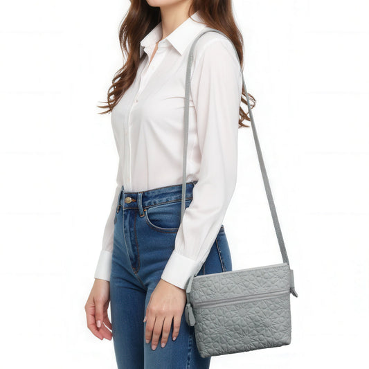 Bolso bandolera de piel grabada – Gris